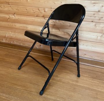 A photo of a folding chair - a good prop for prenatal yoga