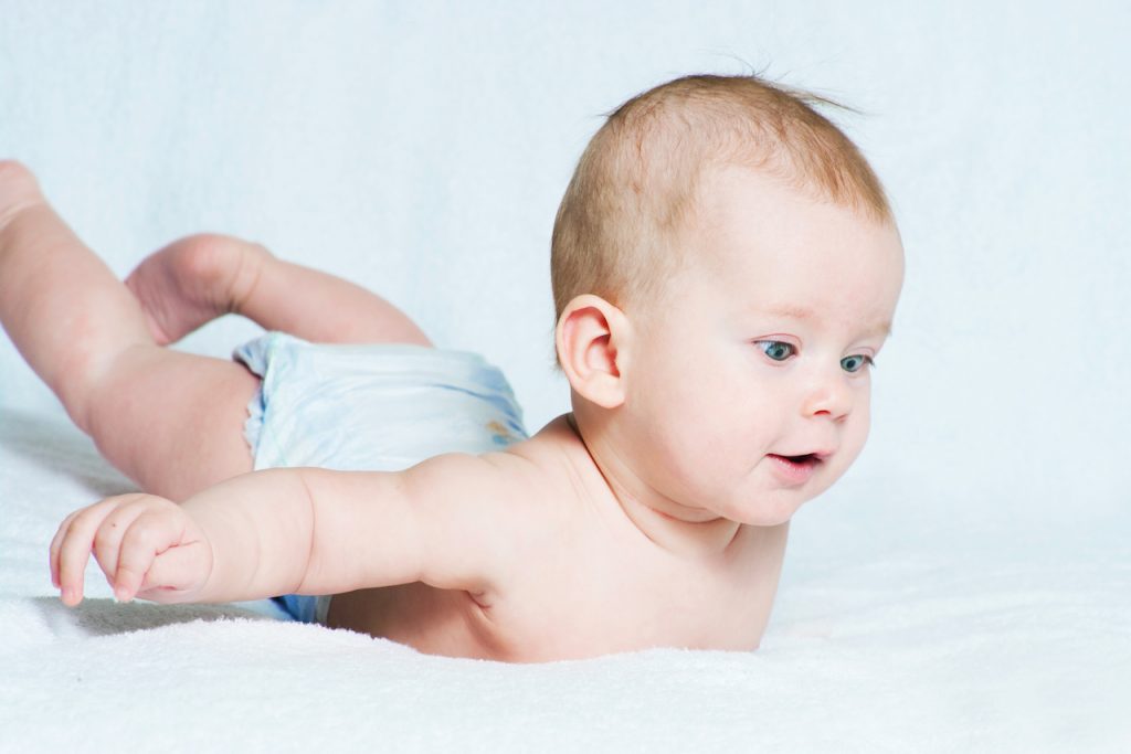 A photo of a Baby in Locust Pose 