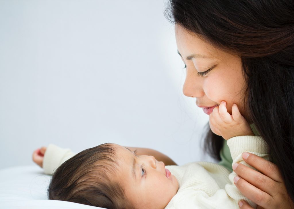 Mother and Baby Demonstrating Social Interaction and Respectful Caregiving